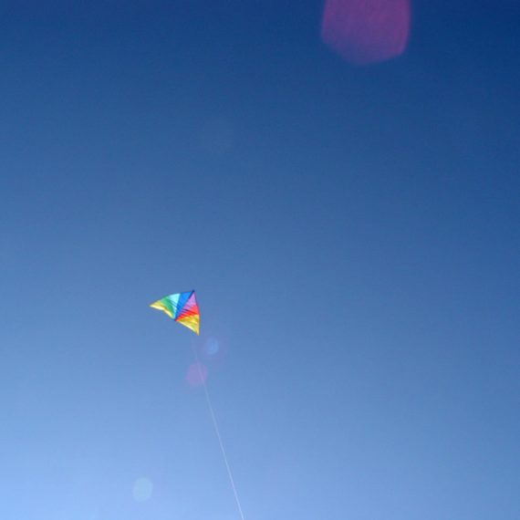 Rainbow kite in sky