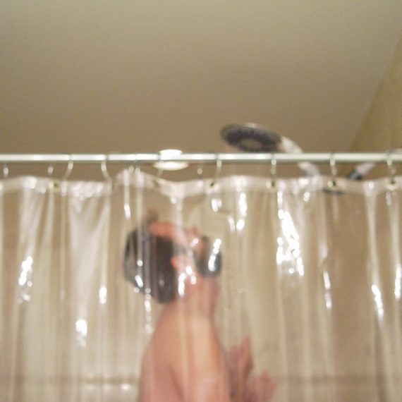 Blurry photo of man in shower