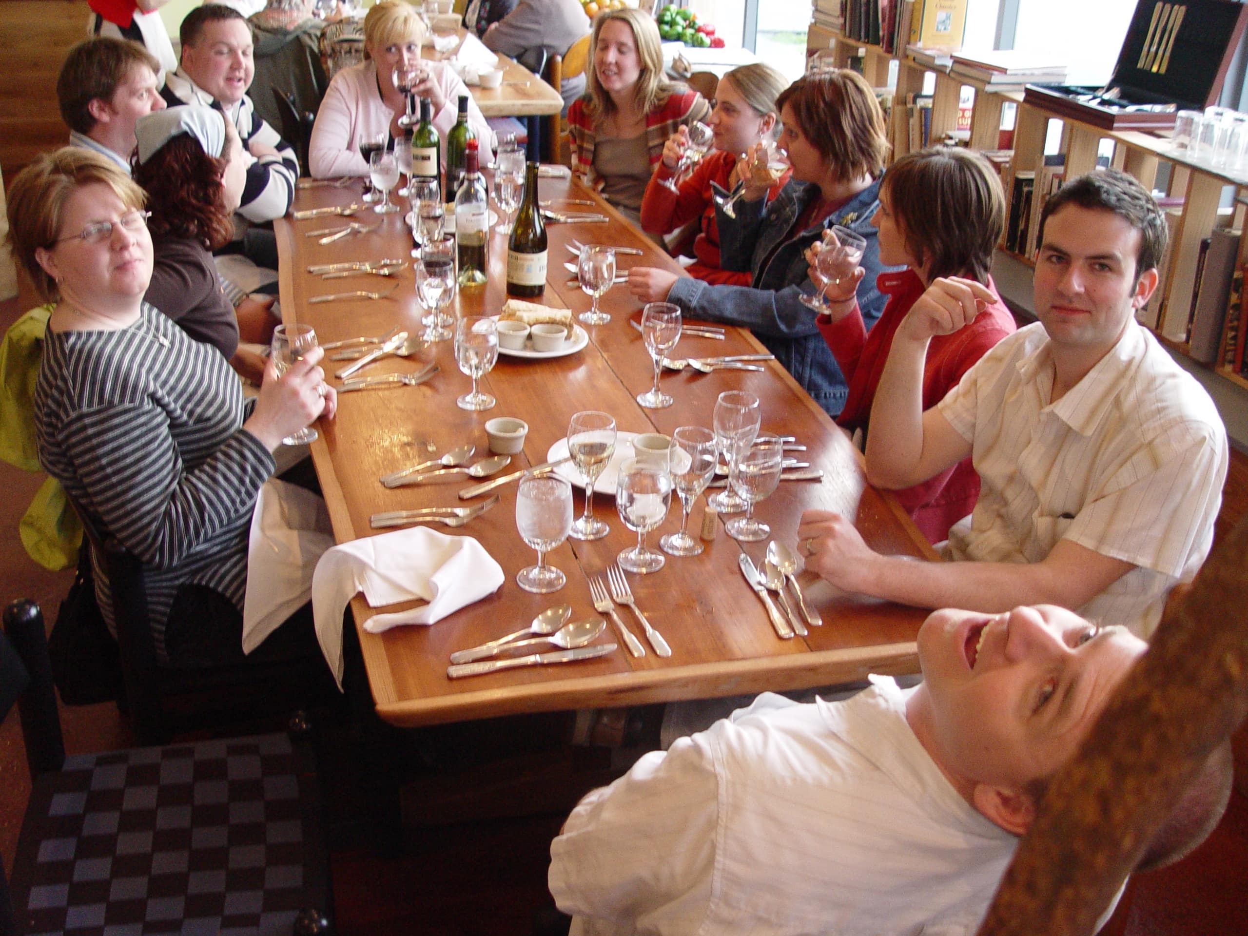 Folks having dinner around a table