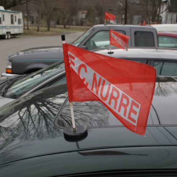 Funeral flags on cars