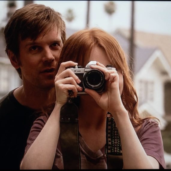 Screengrab from Six Feet Under when Nate says "You can't take a picture of this. It's already gone." to his sister as she looks through the viewfinder of a camera