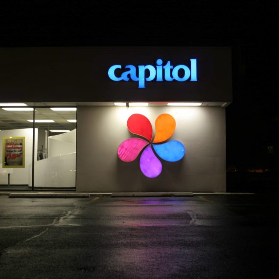 Capitol Cleaners sign at night