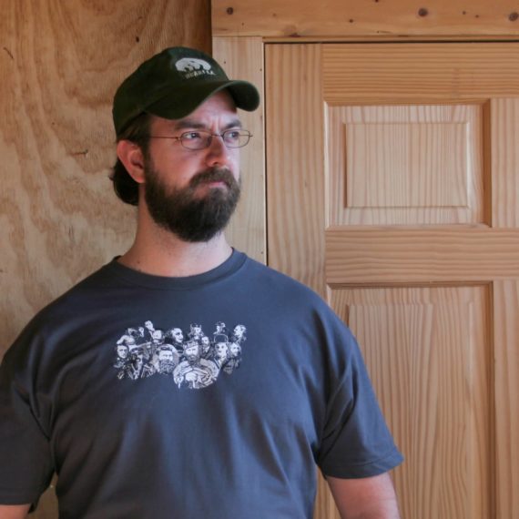 Man with beard in t-shirt of beards