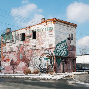 Liberty Tire building with mural of Indian characters and tire