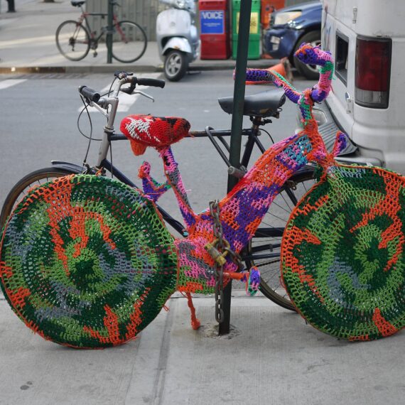 (insert a knitted installation, it can't possibly be a usably bike cover, but man it's pretty)