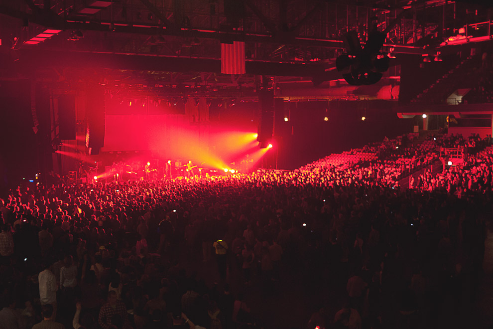 A band performs in an auditorium