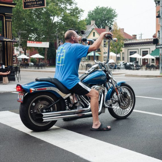 Man on motorcycle with monkeybars