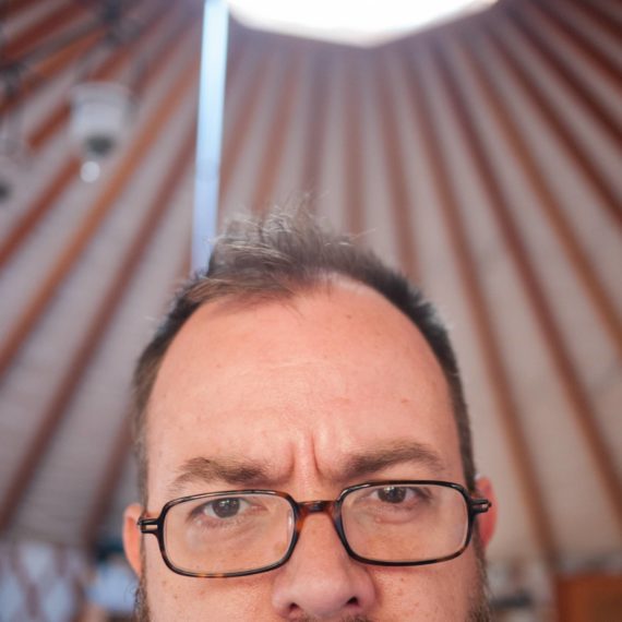 selfie of man in yurt