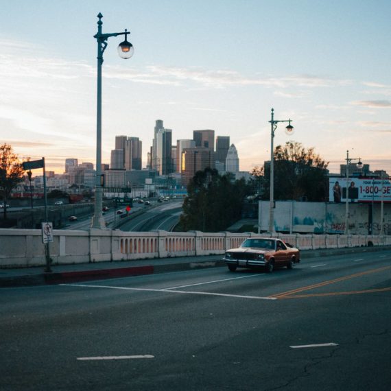 Los Angeles downtown in the background of a street