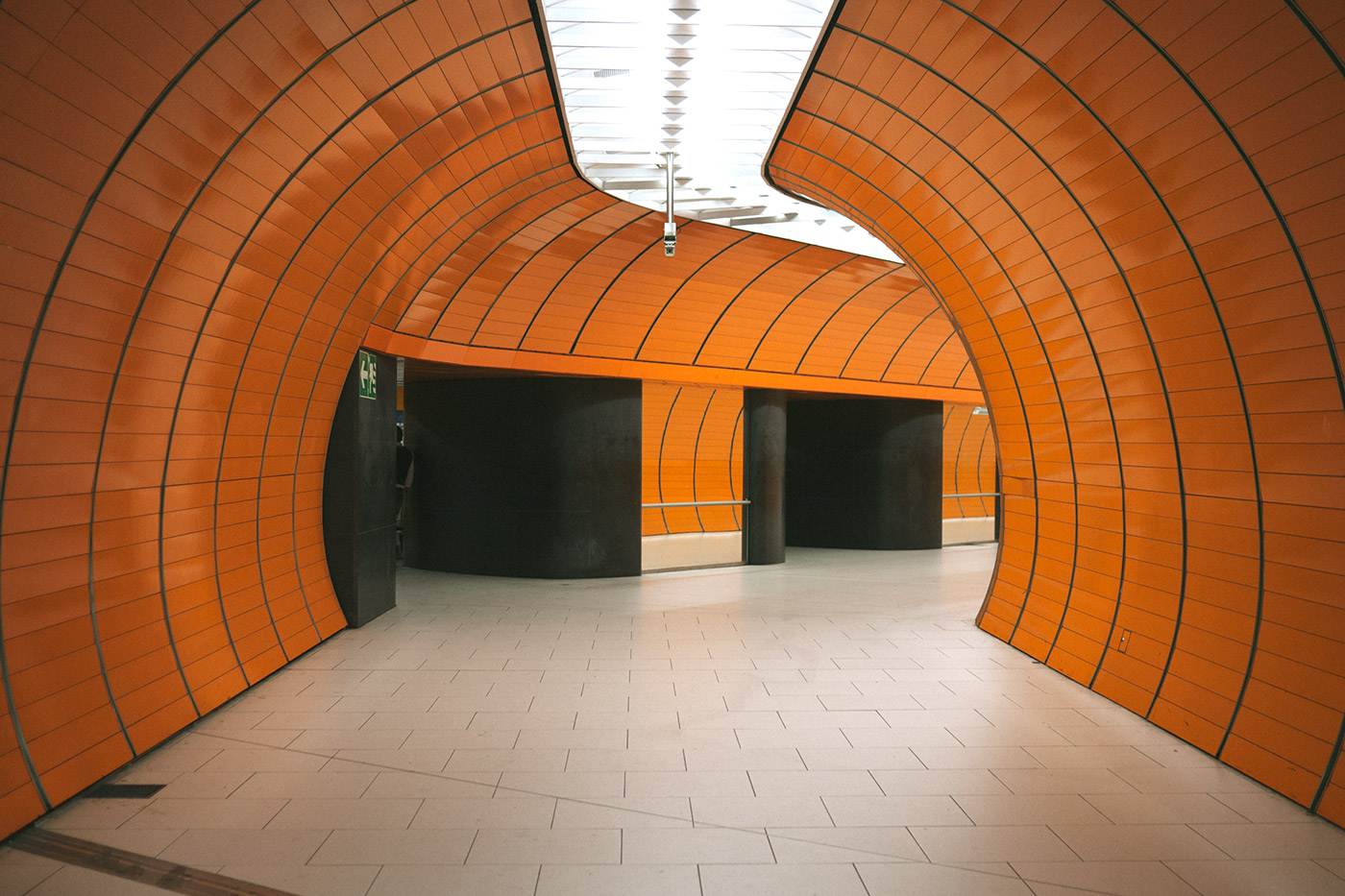 An orange tiled subway