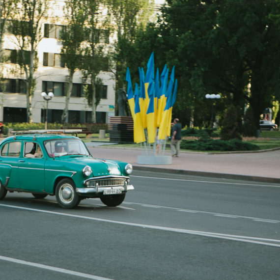 A small green car in Ukraine