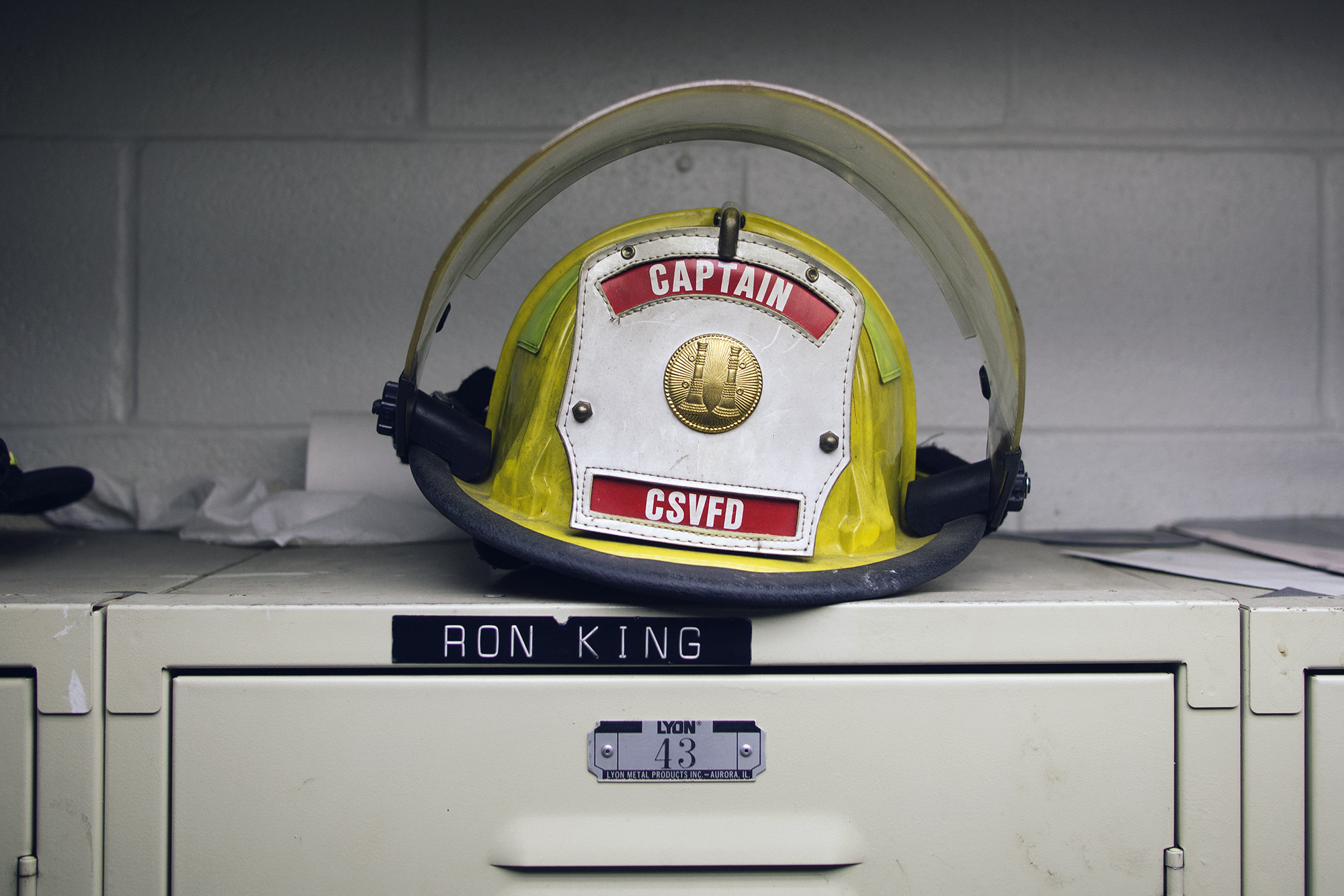 A fireman's helmet with the letters CSVFD