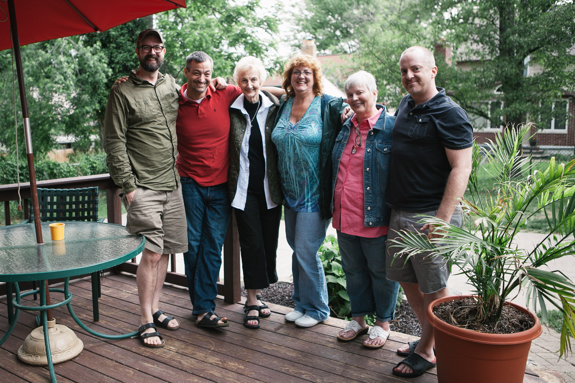 Family stands on a patio