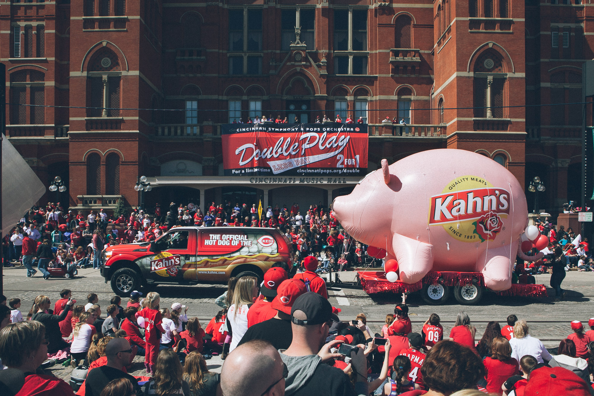 A large pig float in a parade