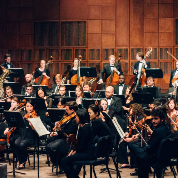 A group of classical musicians in performance