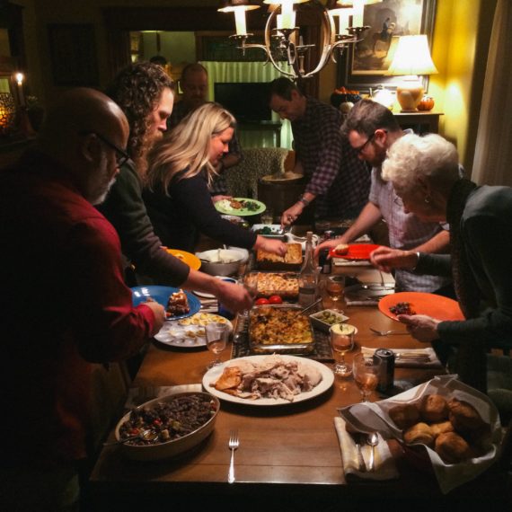 Folks fill up their plates at Thanksgiving