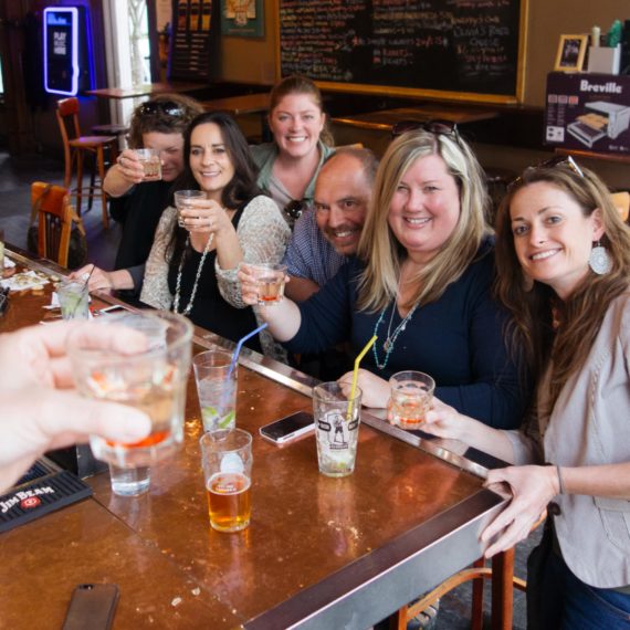 Friends celebrate a birthday at the bar