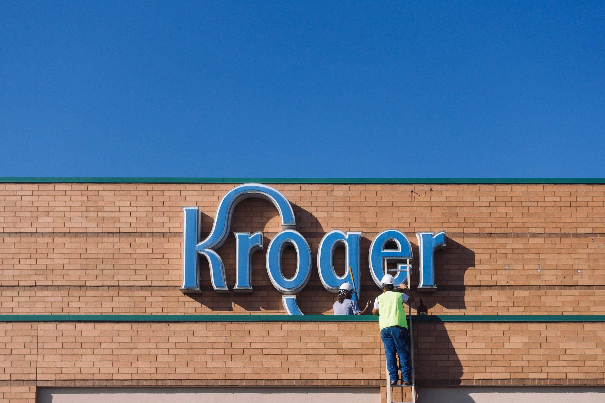 Working on a Kroger sign