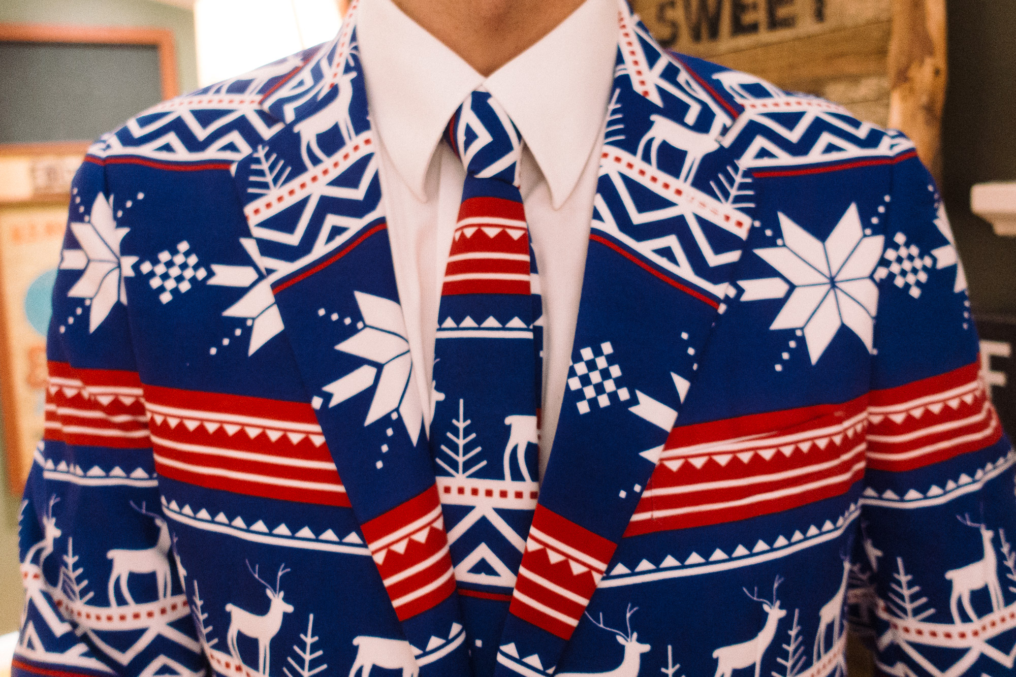 A suit with snowflakes and stripes pattern