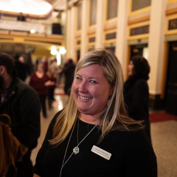 Heather Brown with symphony employee badge