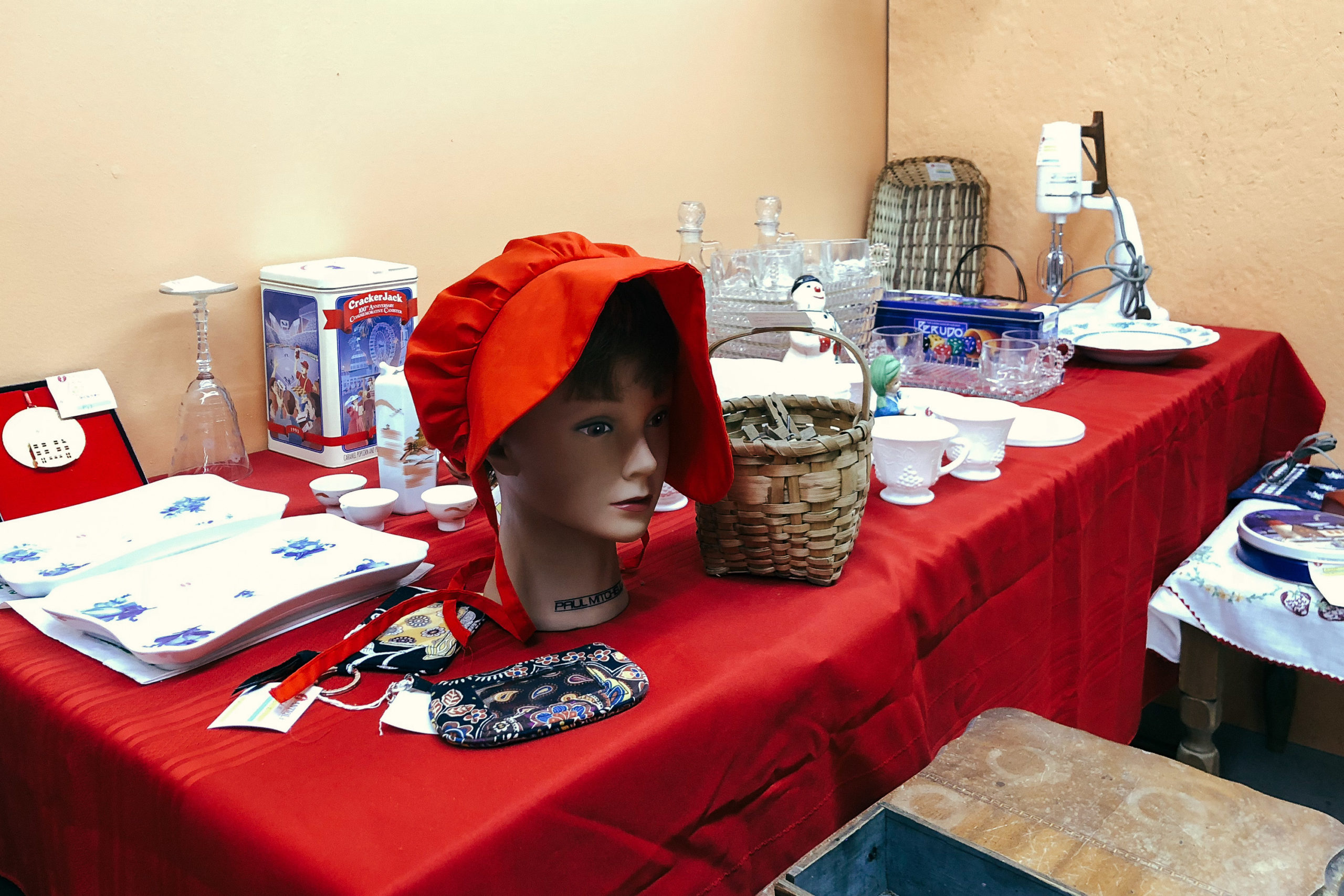 In manikin head with a red bonnet