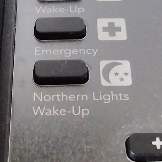 A hotel phone with a Northern Lights button