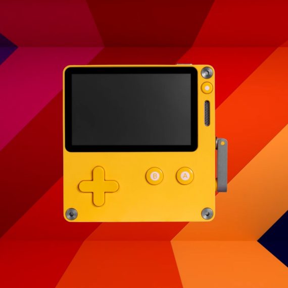 A yellow handheld videogame system