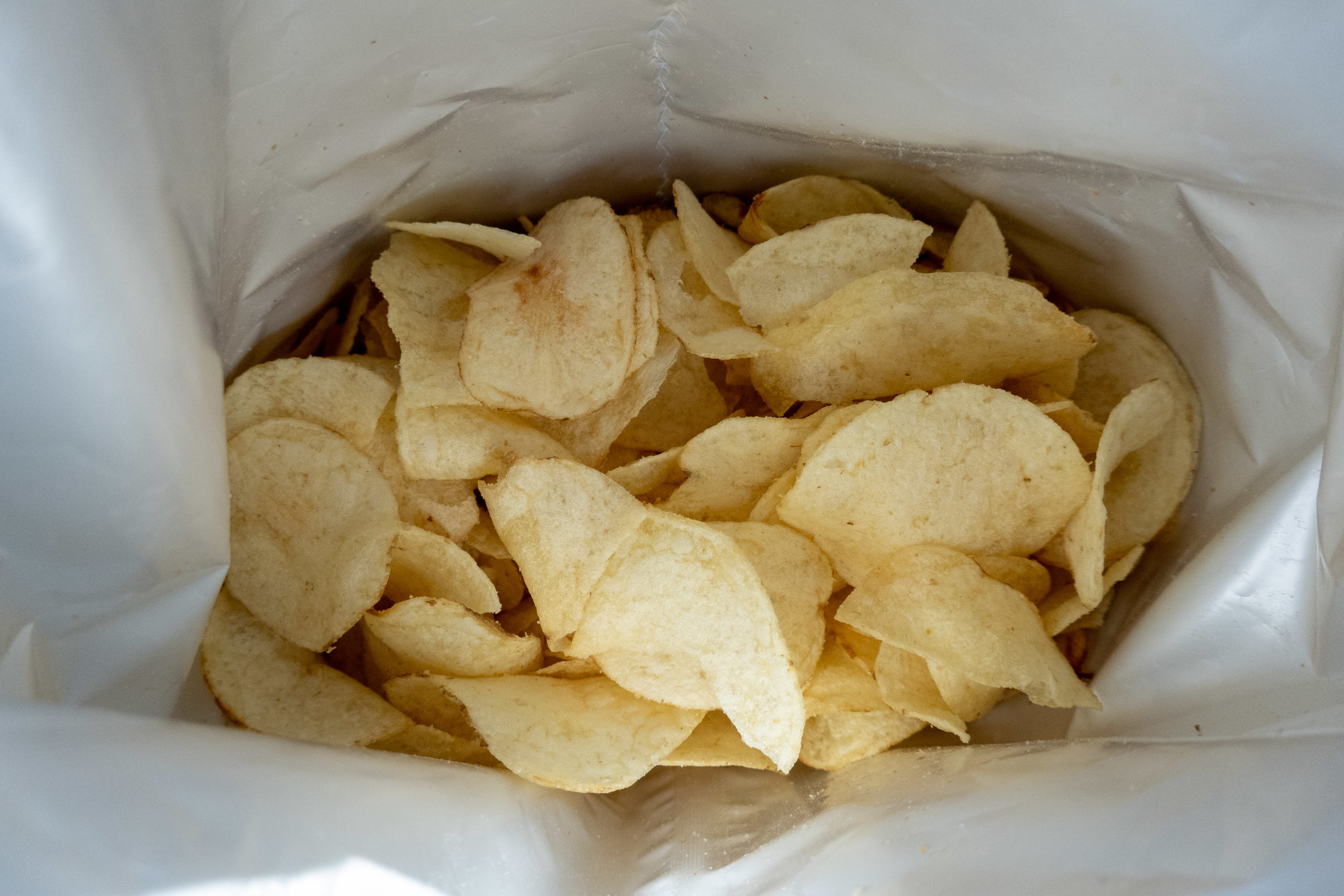 Looking down into a bag of chips