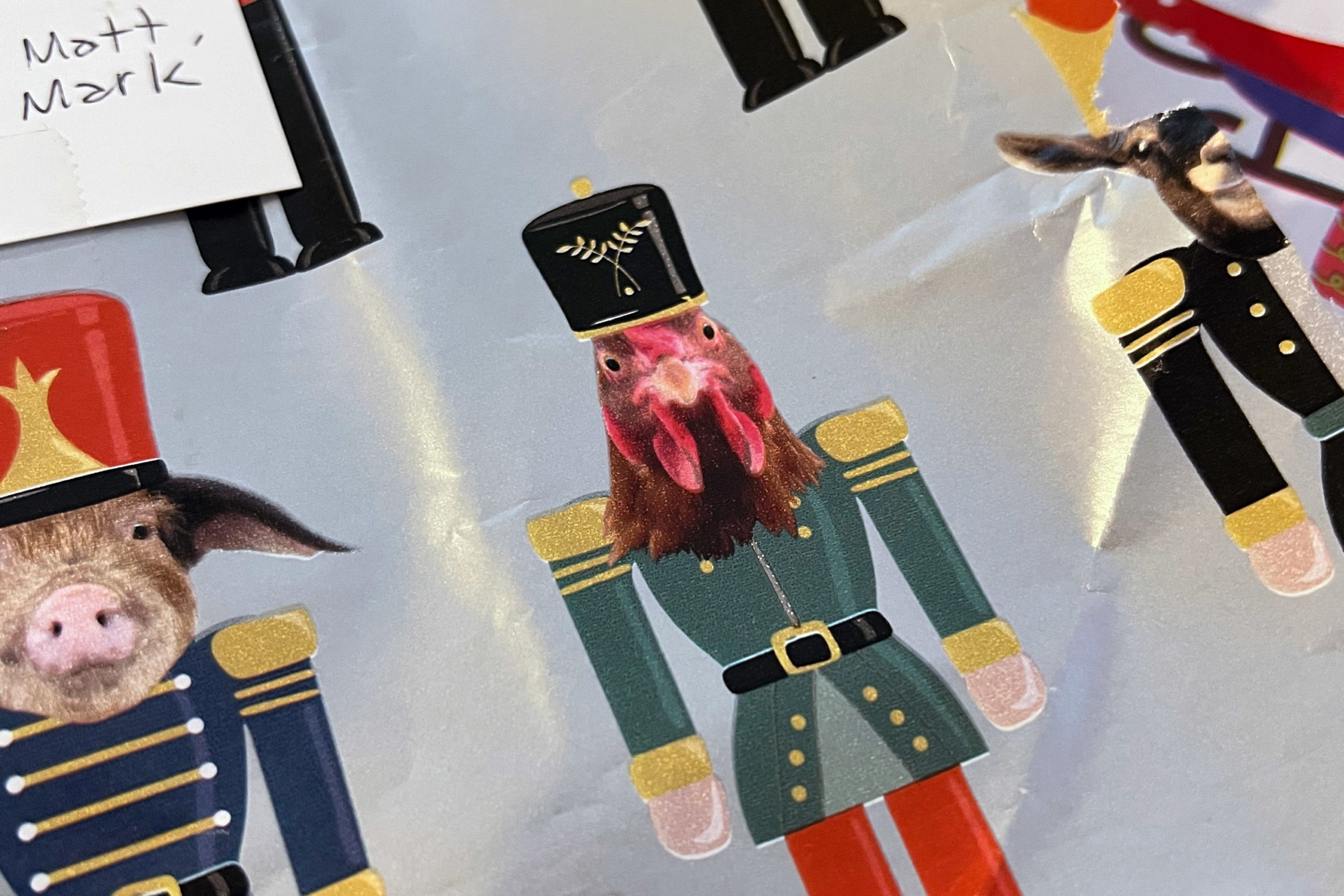 Wrapping paper with a chicken head on a nutcracker