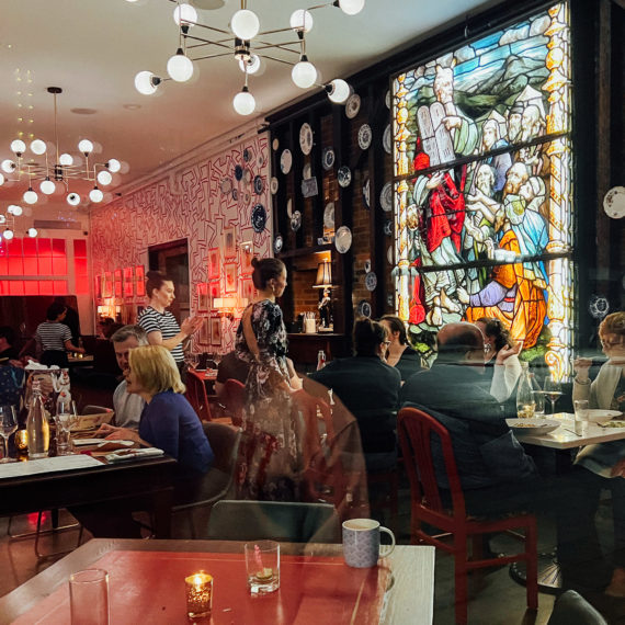 Colorful interior of a restaurant as view through the exterior window