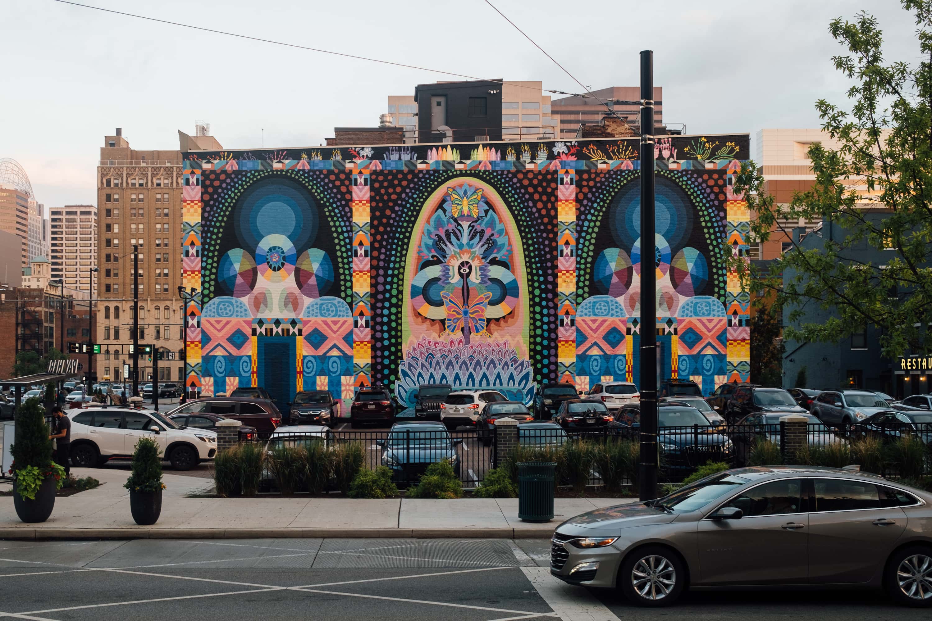 Saya Woolfalk's colorful mural with intricate geometries and arches