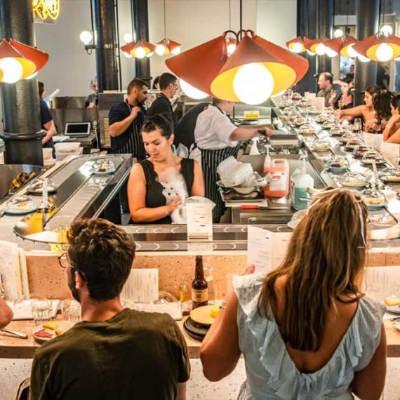 A conveyor belt with cheese instead of sushi