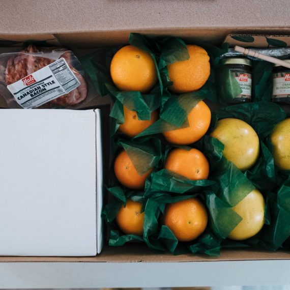 A gift box with Canadian bacon and citrus