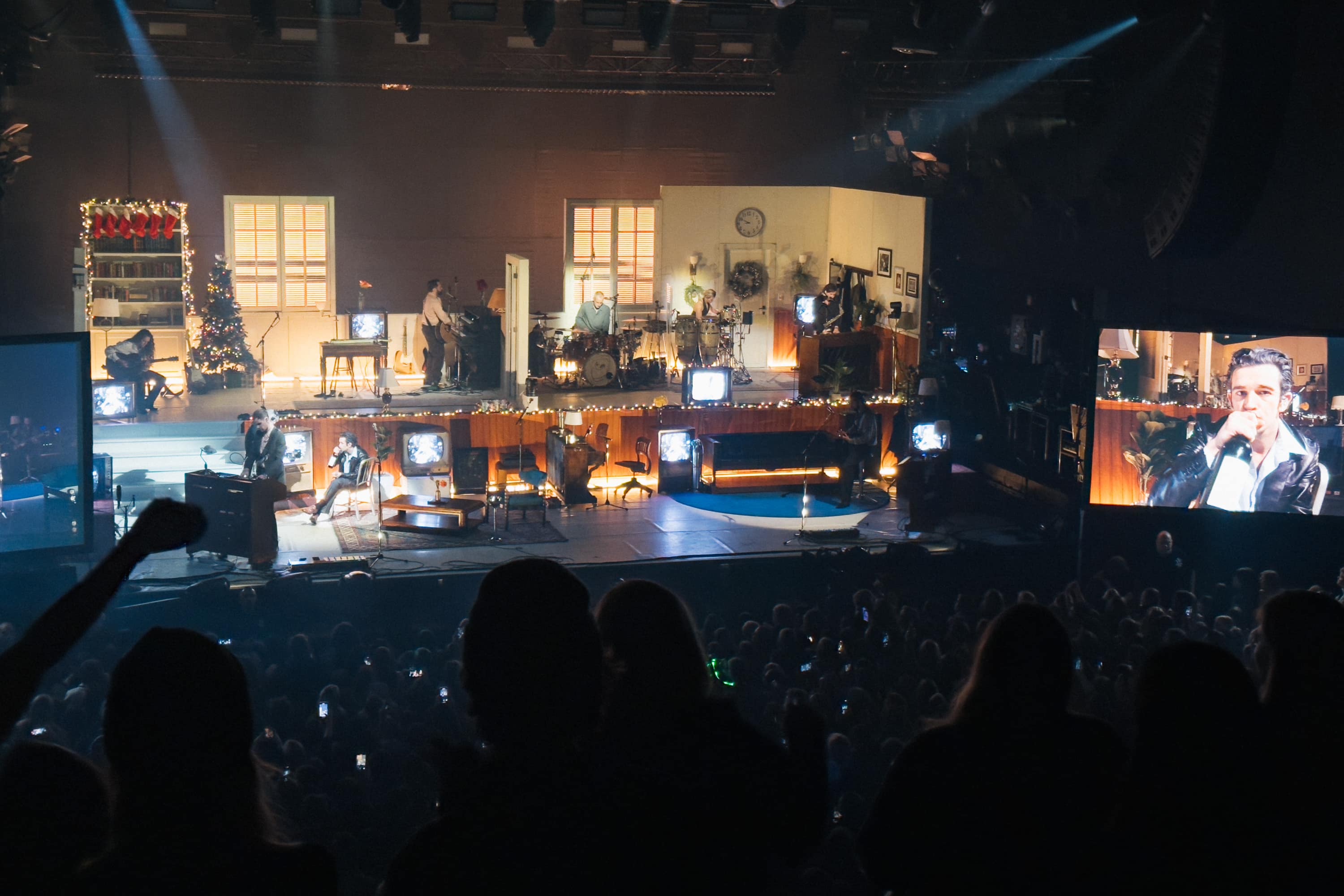 The 1975 perform on stage at the MegaCorp Pavilion