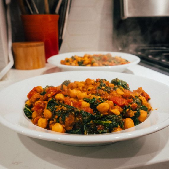 Chickpeas with tomatoes and kale