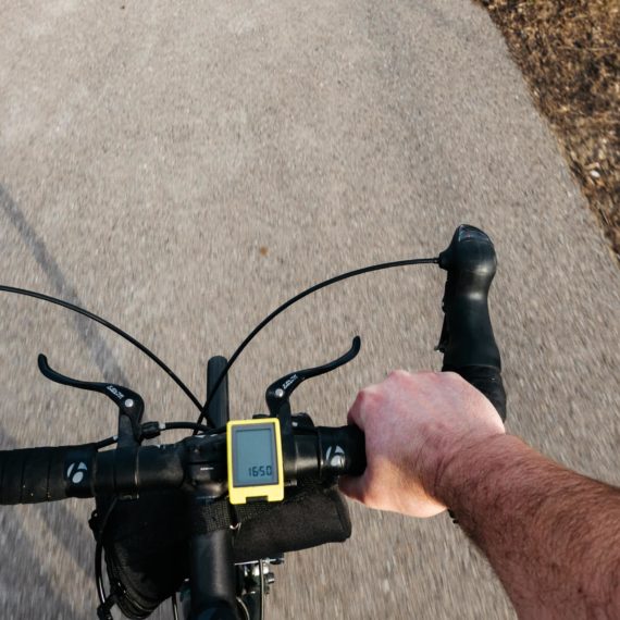 Riding a bike on a paved trail