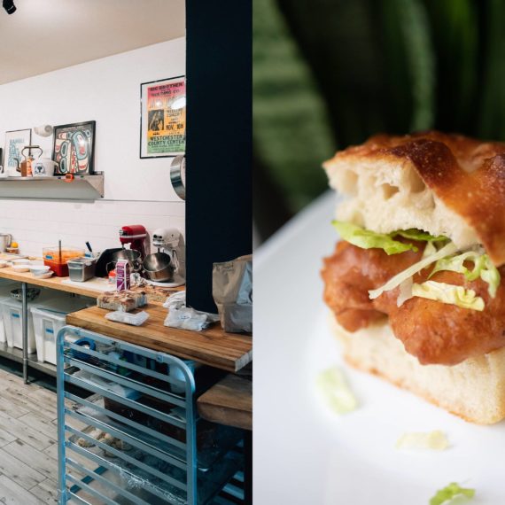 A commercial kitchen, a fried fish sandwich