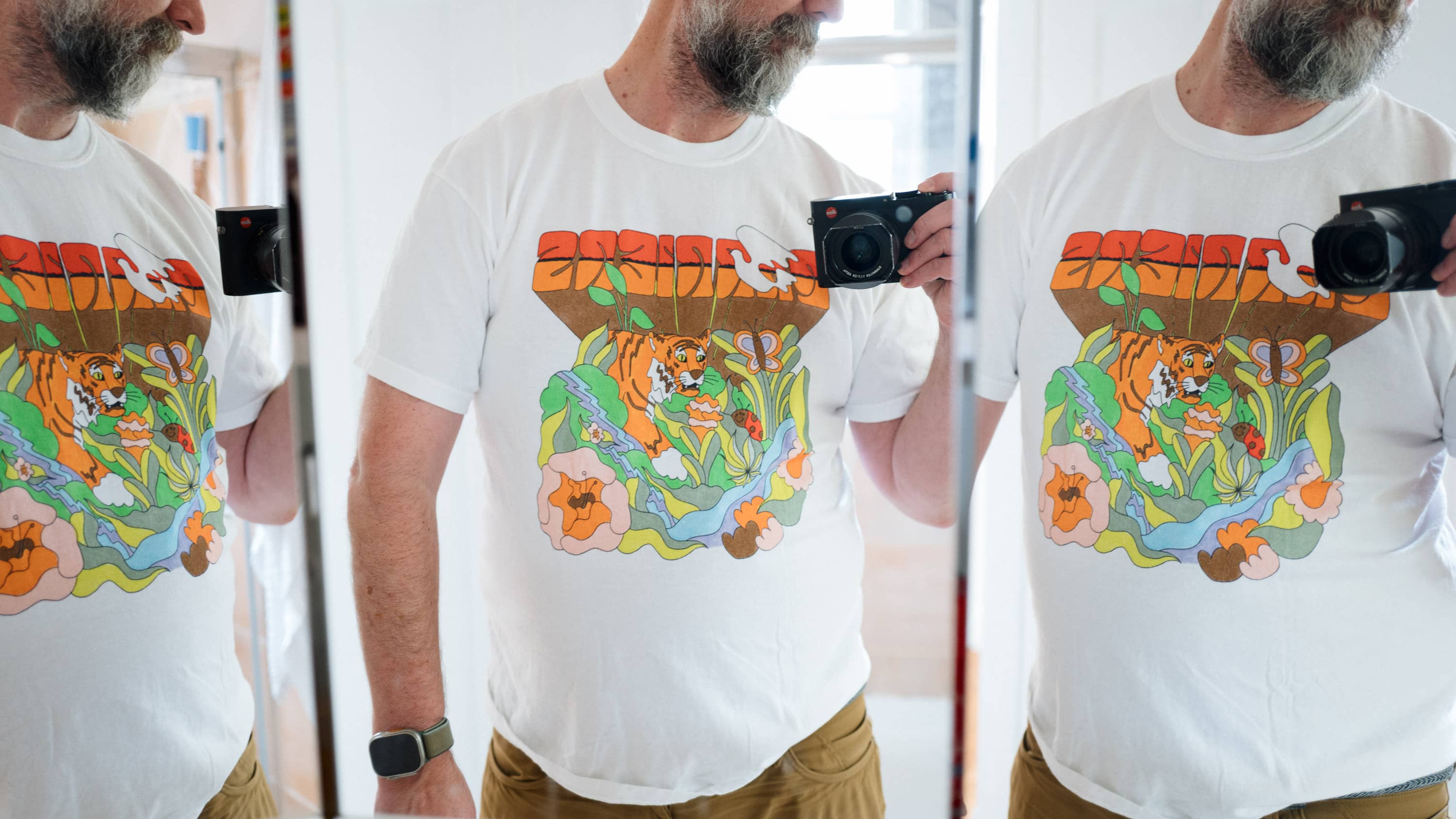 Man in mirror with Carriers band t-shirt