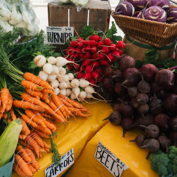 A collection of vegetables on display at a farmer’s market