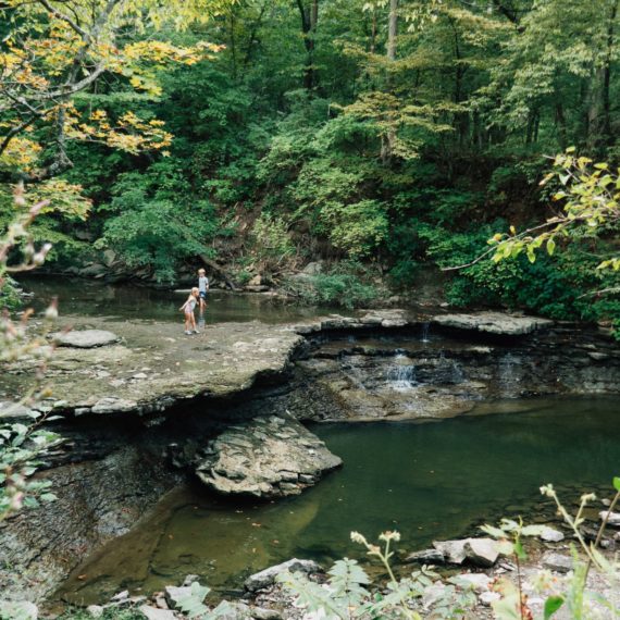 Kids playing in the creek they shouldn't be