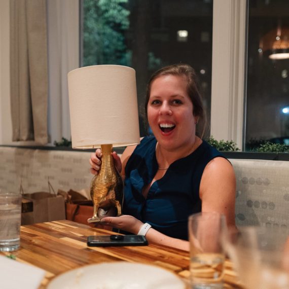 Woman holds duck lamp