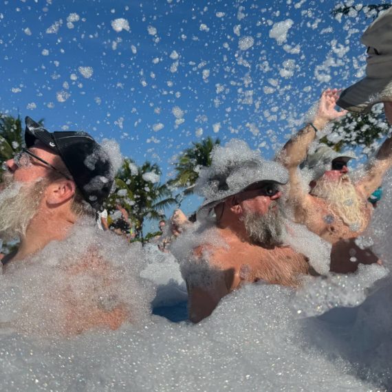 People in pool with soap suds