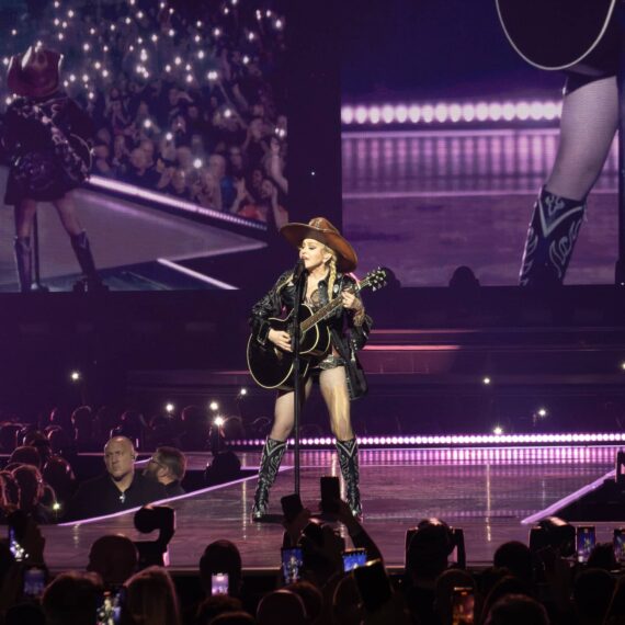 Madonna with guitar and cowboy outfit