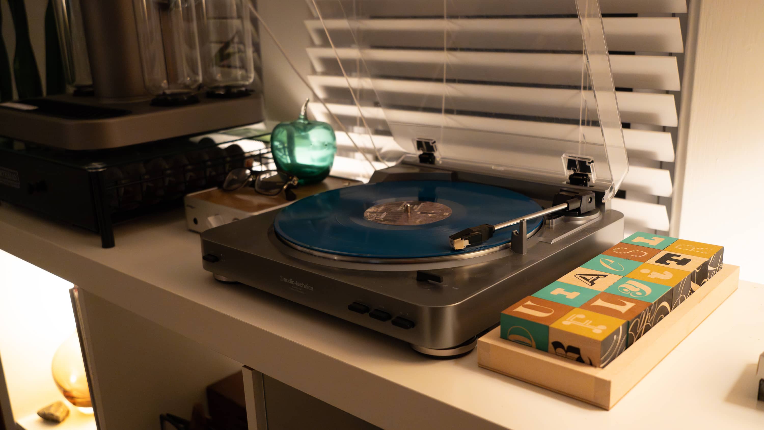 Record player with Folklore by Taylor Swift