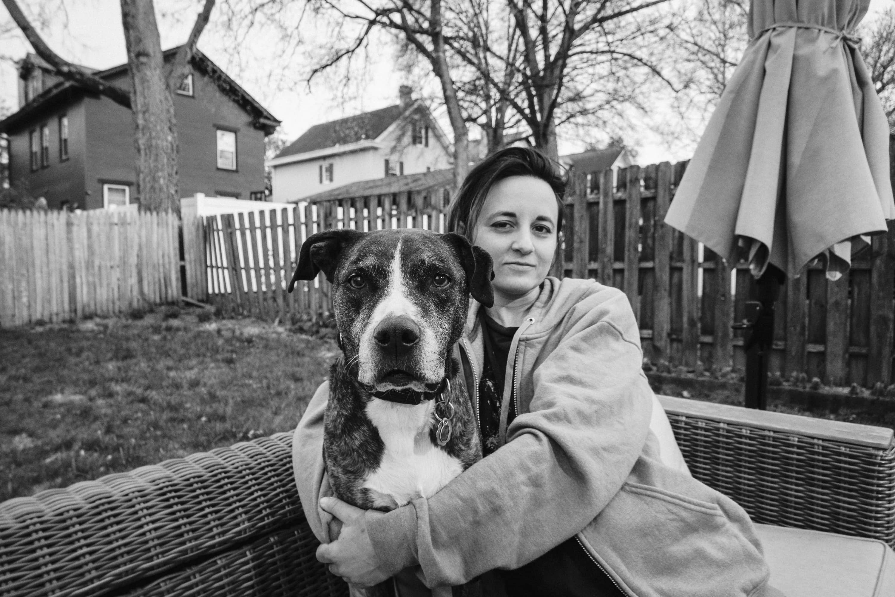 Person and dog on patio couch