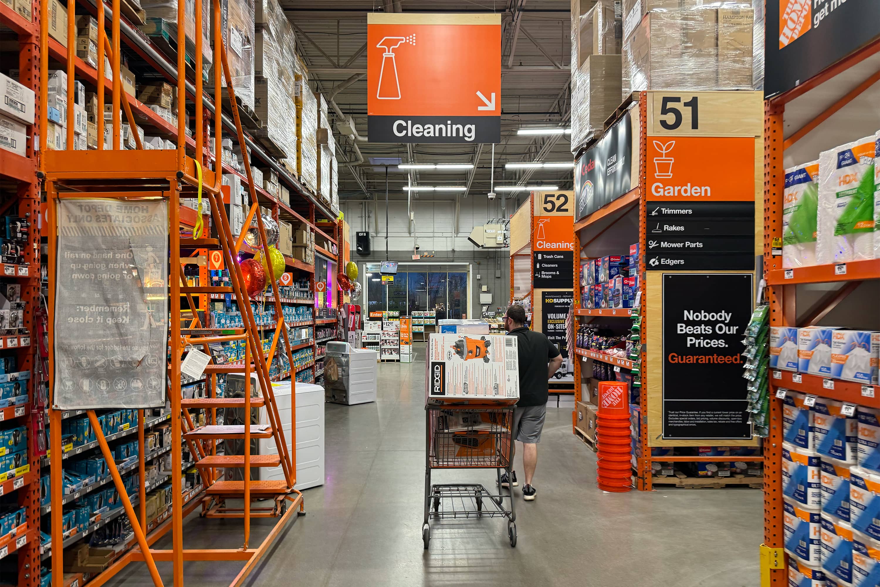 Cart full of Shop Vac and Air Mover at a Home Depot